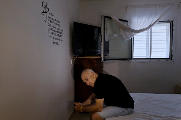 Australian Israeli Geoffrey “Danny” Majzner sits in his bedroom in Kibbutz Be’eri where he took shelter for 30 hours during the October 7 Hamas attack. Geoffrey’s sister Galit Carbone was killed by Hamas in her home a few streets away.