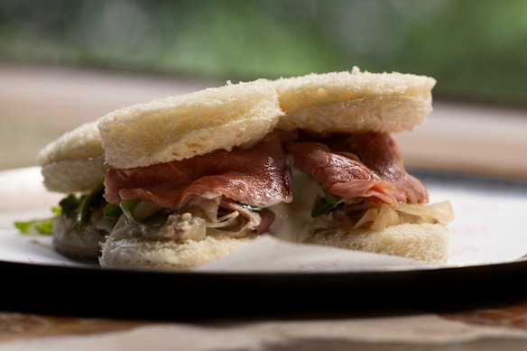The Italian classic of vitello tonnato is presented in sandwich form.
