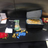 Gold bullion, luxury cars and cash seized in alleged $10 million NDIS scam