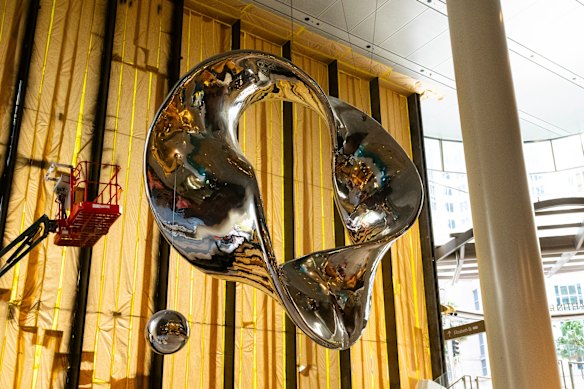 A four-metre steel sculpture dangles from the ceiling of the northern entrance.