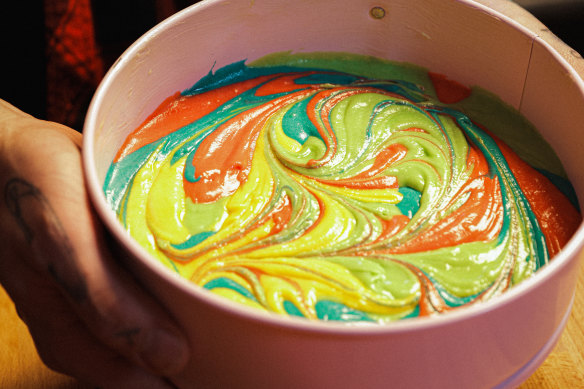 Create a marbled effect using food dye and a skewer or butter knife.