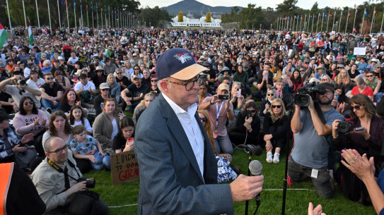 Prime Minister Anthony Albanese leaves after addressing a rally in Canberra on Sunday that called for action to end violence against women.