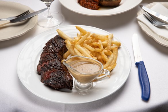 Steak frites with sauce diane and house-made fries.