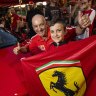Carlton’s Lygon Street turns Ferrari red as revellers celebrate F1 victory