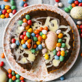 Decorate this triple chocolate tart with Easter eggs or seasonal fruit.