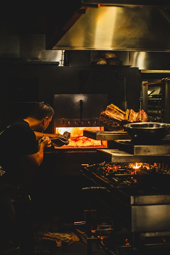 Firedoor’s Lennox Hastie tends to the fire.