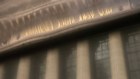 The New York Stock Exchange in the rain. The bourse has attracted some of Australia’s biggest companies.