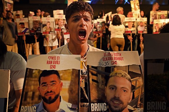 A relative of a hostage during speeches to a gathering in Tel Aviv’s “Hostage Square”.