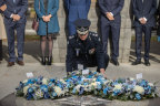 Chief Commissioner Shane Patton laying a wreath at a memorial to the fallen officers.