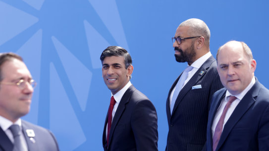 British Prime Minister Rishi Sunak, Secretary of State for Foreign, Commonwealth and Development Affairs James Cleverly and Secretary of State for Defence Ben Wallace arrive on the first day of the 2023 NATO Summit in Vilnius, Lithuania.