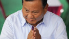 Prabowo Subianto gestures after casting his vote yesterday.