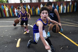 Kings in waiting: Members of the Sydney Comets Green under-12 squad show off their skills in Redfern.