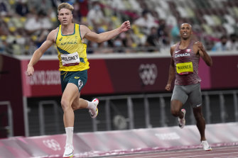 Ash Moloney leads Damian Warner of Canada as they race to the line in the decathlon 400 metres in Tokyo.