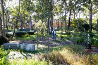 Sister Therese, of Daughters of Charity of St Vincent de Paul, in the garden of the new nun’s living quarters, designed by Ha Architecture, which is a finalist in the multiple housing category of the 2022 NSW Architecture Awards.