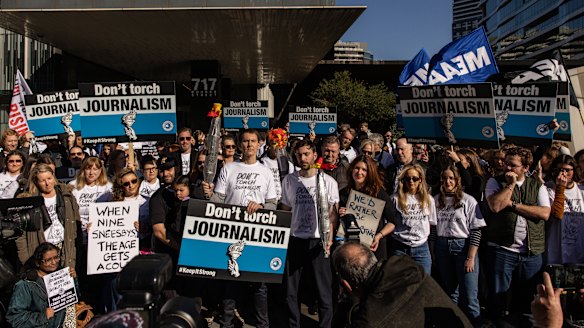 Striking workers outside Nine’s offices in Melbourne on Friday.