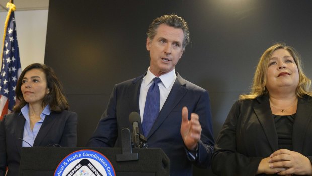 California Governor Gavin Newsom speaks to members of the press at a news conference in Sacramento on Thursday. 