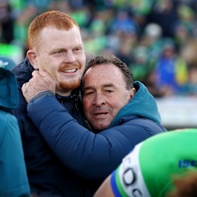 Raiders coach Ricky Stuart hugs star forward Corey Horsburgh after the win. Stuart's passion has kept Canberra competitive in the NRL for years.