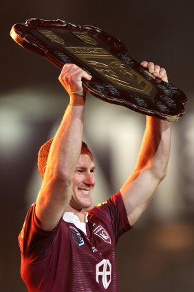 Maroons skipper Daly Cherry-Evans lifts the Origin shield for Queensland in July.