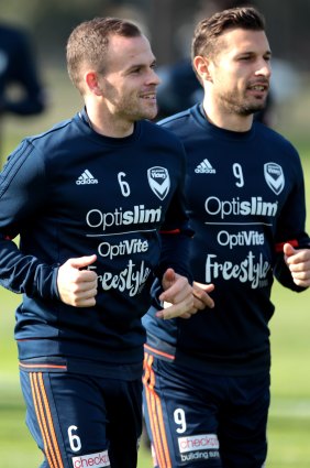 Leigh Broxham (left) prepares for A-League grand final No.5 with Kosta Barbarouses.