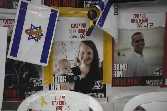 A poster shows Shiri Bibas, who was kidnapped to Gaza with her husband and two young sons.