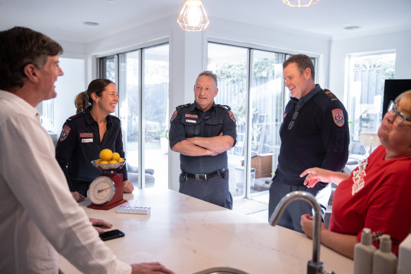 Mark Hardeman with the paramedics who helped save his life, (from left) Lia Wassell, Al Gailey, Philip Williams and Glenice Winter.