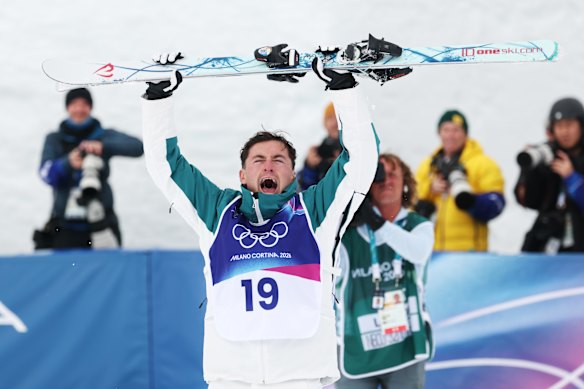 “Let’s go!“: Cooper Woods celebrates after winning gold at the men’s moguls final.