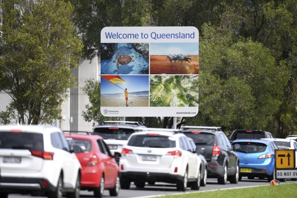 Long queues plague motorists arriving at Queensland border checkpoints.