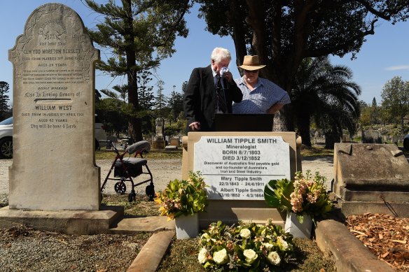 Bill Hamburger, left, the great-great-grandson of William Tipple Smith, stands at Smith's grave in Rookwood Cemetery during the unveiling of a new headstone and plaque on Thursday.