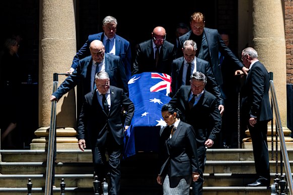The coffin departs following the state funeral for Graham Richardson.