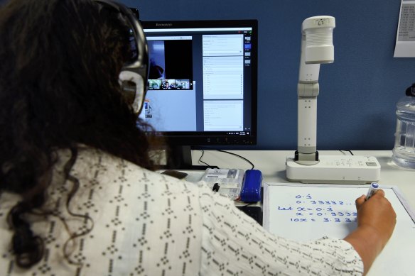 Aurora College maths and science teacher Mahezabeen Tariq teaches remote year 10 students via a virtual classroom.