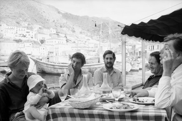 Marianne Ihlen with her baby son, Axel Jensen, with Leonard Cohen, an unidentified friend and George Johnston and Charmian Clift on Hydra in October 1960. 