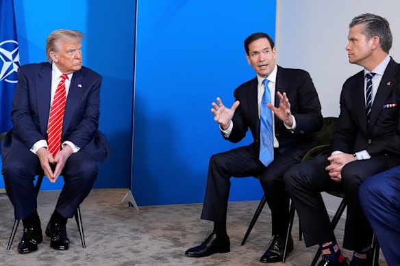US President Donald Trump and Defense Secretary Pete Hegseth listen as Secretary of State Marco Rubio speaks during a NATO meeting. 