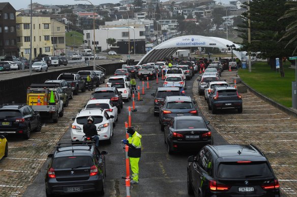 Cars queuing at the St Vincent’s Hospital Bondi Beach Drive-through COVID-19 testing clinic.