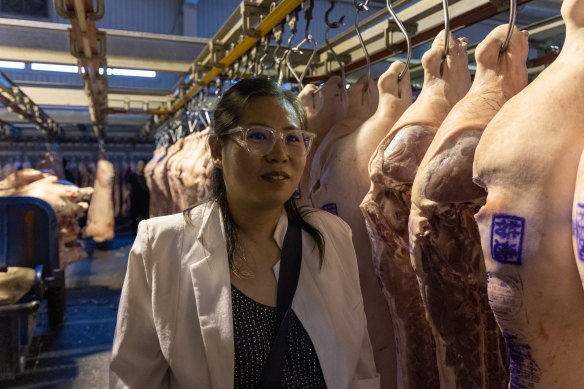 Chinese pork wholesaler Hou Yujing says customers have poor purchasing power. 