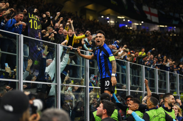 Lautaro Martinez celebrates with the Inter Milan faithful.