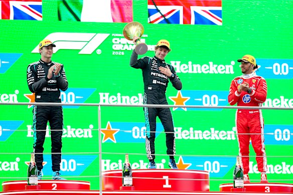 Chinese Grand Prix race winner Kimi Antonelli (centre) with teammate George Russell (left) and Ferrari’s Lewis Hamilton on the podium.