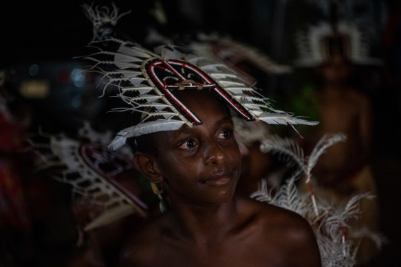 Boy in traditional Dhari headdress at the celebrations.