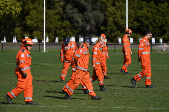 SES perform a line search at Kilsyth Park opposite the street where Mr Salaris was found dead. 