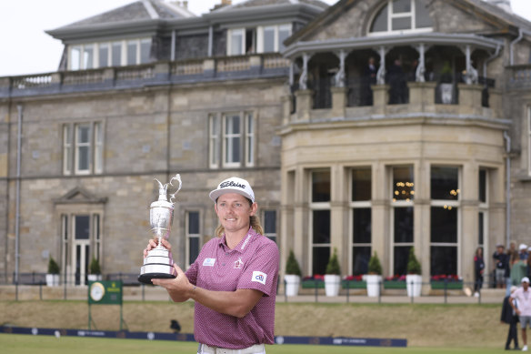 Cameron Smith poses with the famous claret jug after his victory at St Andrews.