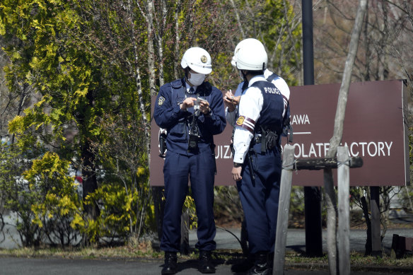 Police officers stand guard near the meeting of the G7 in Tokyo in April.