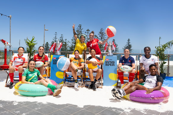 Team captains pose together with the event trophies in Perth. 
