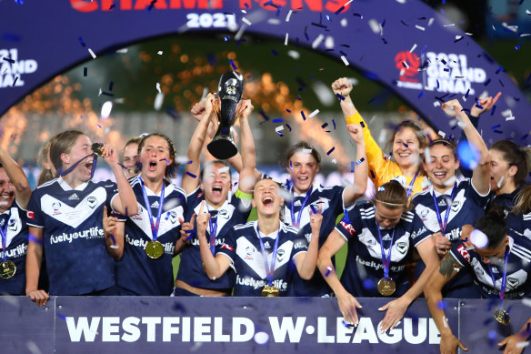 Oh so sweet: Melbourne Victory celebrate their title triumph.