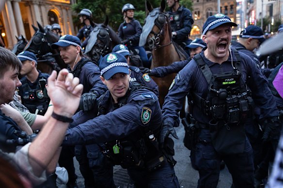 Police at a protest outside Sydney Town Hall on Monday night.
