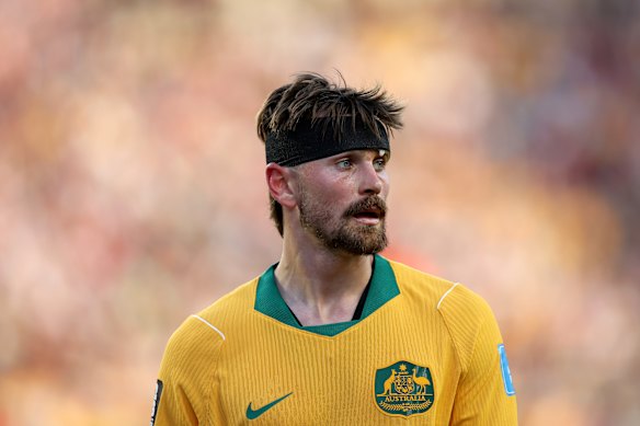 Connor Metcalfe #8 of Australia looks on.