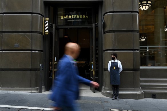 The Barberhood’s senior barber Raphael Theodoulou is among workers looking to the city’s council to help draw workers and visitors back to the CBD.