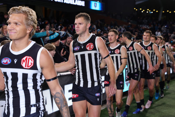 Port Adelaide’s Dan Houston (second from left) wants to play for a Victorian club in 2025.