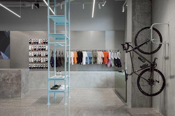 A bicycle attached to one wall is treated more like a piece of sculpture.