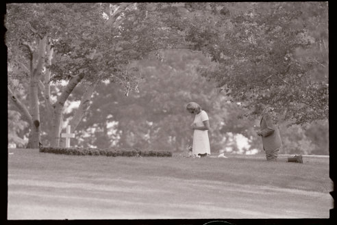 Ethel Kennedy kneels by the grave of her late husband in an early morning visit to Arlington National Cemetery in June, 1969, on the first anniversary of his assassination.