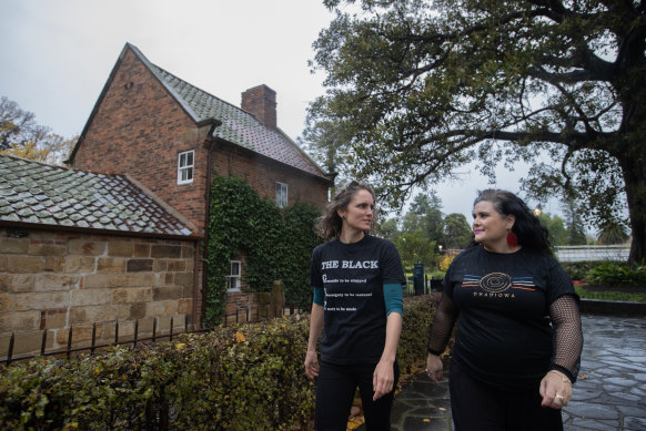 Academics Clare Land and Paola Balla outside Cooks’ Cottage on Tuesday.