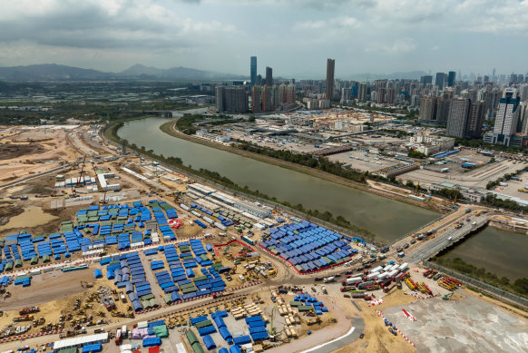 A temporary isolation facility to house COVID-19 patients being built next to a temporary bridge linking Shenzhen and Lok Ma Chau over the Shenzhen River, separating Hong Kong from the Chinese mainland.